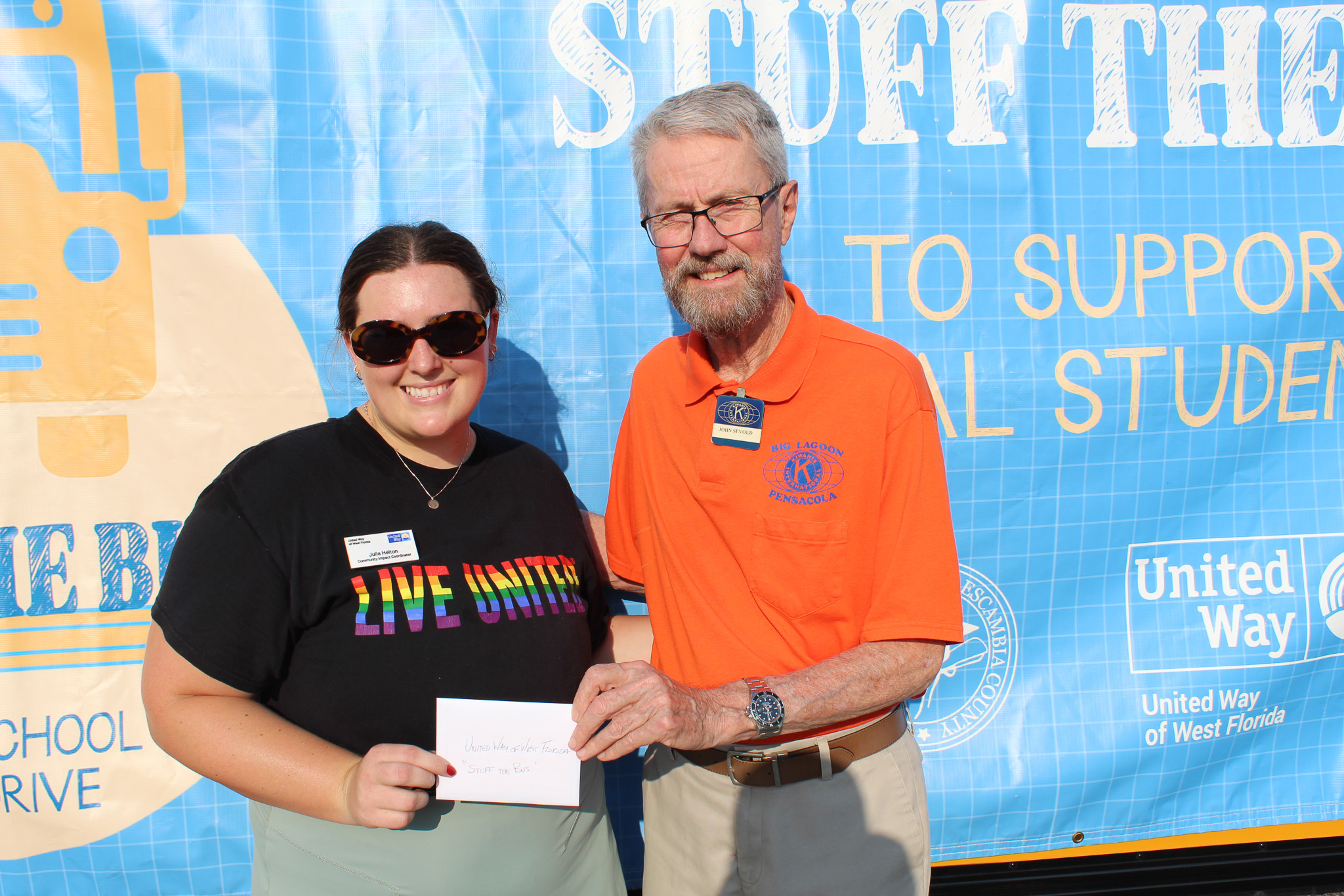 Kiwanis of Big Lagoon presenting UWWF with $1,500 to Stuff the Bus