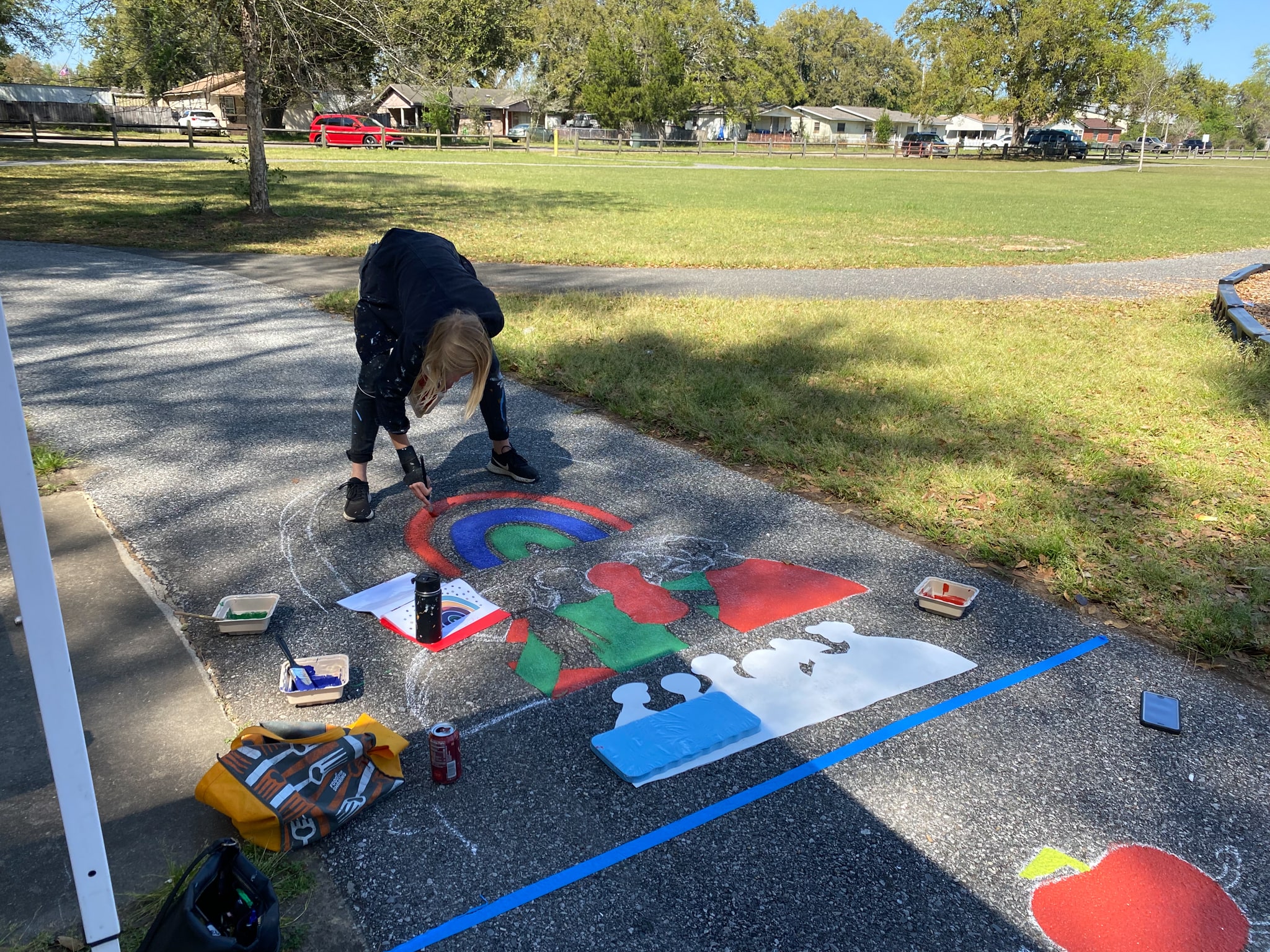 Local muralist in process at Chimes Way-min.jpg