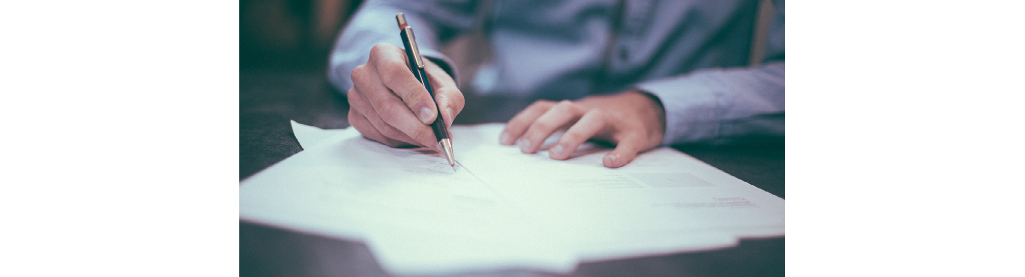 Man preparing financial report.