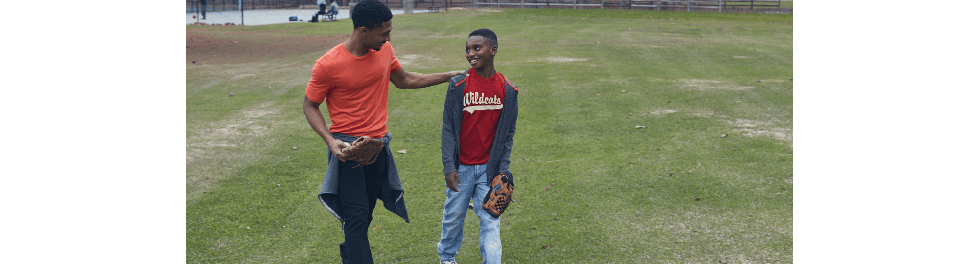 Two boys playing baseball.