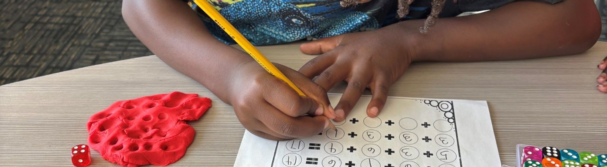 Boy working on a worksheet.