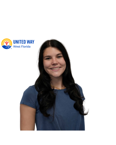 Girl in a blue shirt with dark hair and a white background.